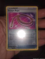 Clear photo of Pokemon Escape Rope holo foil card showing front side with artwork and text visible.