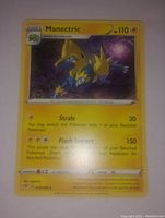 Manectric Pokémon card with visible front showing card details, attacks, and artwork.