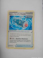 Photo of a single Rapid Strike Scroll of Swirls Pokémon Trainer card displaying the artwork and text clearly.
