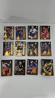 View of hockey cards from 1995-96 Pinnacle Zenith series showing multiple rookie cards with gold foil and prominent player images.