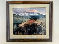 Framed photographic print showing the full artwork with wood frame and cream matting.