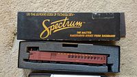 Maroon Spectrum brand HO scale Pennsylvania locomotive in original foam-lined box.