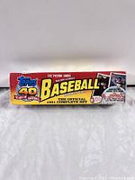 Front view of the sealed box showing branding and card count