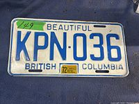 Front view of a metal British Columbia license plate with the number KPN-036 and the year sticker 1972