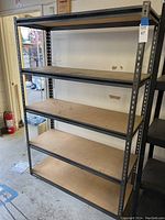 Full view of the five shelf adjustable metal and wood storage rack showing entire rack with wood shelves and metal frame