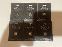 Six Italian charm bracket interchangeable links displayed on original packaging cards