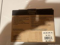 Back of box with product features and specifications including installation instructions and door thickness compatibility.