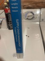 Side spine view of the textbook showing title, authors, and edition