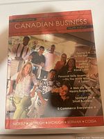Front cover of Understanding Canadian Business textbook showing title, authors, and topics covered.