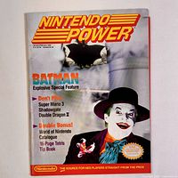 Front cover of the Nintendo Power magazine January-February 1990 issue featuring Batman Explosive Special Feature and promotion of Super Mario 3, Shadowgate, Double Dragon II.
