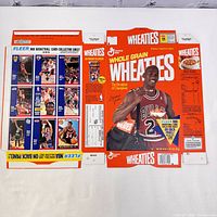 Full flat layout of a Wheaties cereal box featuring Michael Jordan in Bulls photo with promotional content on back panel.