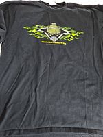 Full front view of black Harley Davidson T-shirt showing graphic centered on chest.