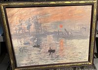 Full view of the framed print showing the harbor scene with ships and red sun.