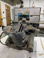 Front/top view of Delta plate joiner showing motor housing, base and fence assembly