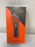 Front of the original box showing Etenwolf branding and product image of the T300 tire pressure gauge with digital screen and probe.
