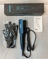 Full set showing the SAOSA hair crimper, black gloves sealed in plastic, user manual, and branded box.