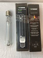 Vivasan Super HPS 600W lamp with original packaging showing product name and features.