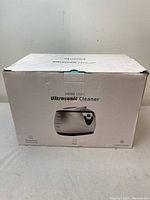 Box of the UKOKE 3800S Ultrasonic Cleaner showing product image and model information.