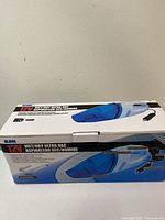 Front side of original box showing image and product name of the iLink 12V Wet/Dry Ultra Vacuum.