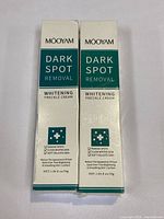 Two boxes of Mooyam Dark Spot Removal Whitening Freckle Cream side by side