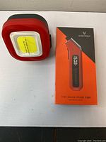 Top view of the red LED magnet lamp and box of the Ettenwolf Tire Gauge Probe T300 digital gauge