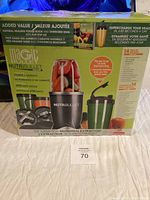Front and side view of the NutriBullet Magic Bullet packaging displaying product image, contents, and features.