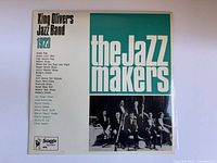 Cover of King Oliver's Jazz Band vinyl album titled 'the Jazz makers' showing band photo and track list.