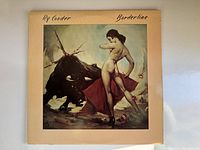 Front cover of Ry Cooder Borderline album showing bullfight artwork with woman and bull.