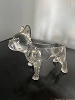 Side front view of clear flint glass Boston Terrier candy jar figure, no lid on back.
