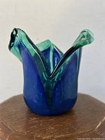 Front angled view of the Murano green and blue art glass vase showing shape and colors.