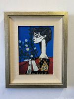 Front view of framed Picasso print showing entire artwork with frame and mat.