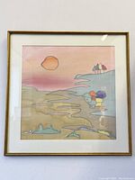 Straight front view of framed painting with visible sun, water, and houses in pastel colors.