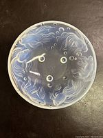 Top view of the Sabino opalescent glass bowl showing the raised fish and bubbles marine design.