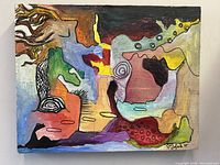 Front view of vibrant abstract oil painting signed by Daniel Tofach, showcasing colors and shapes clearly