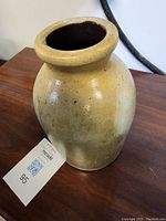 Full view of the old ceramic cream jug showing the shape and glaze.