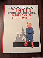 Front cover of the hardcover book showing Tintin and title.