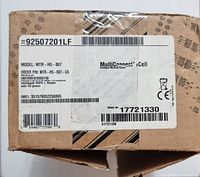 Photo of the Multitech MultiConnect rCell packaging box with product label showing model MTR-H5-B07, IMEI, serial number, and embedded HSPA+ router information.