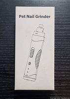 Front of the pet nail grinder box showing product illustration and name.
