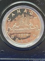 Reverse side showing Voyageur design with canoe and 1975 date