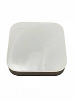 Top angled view of Apple AirPort Express showing surface scuffs and embossed Apple logo