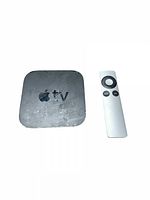 Apple TV device and remote control showing wear on device surface
