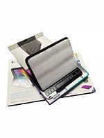 Purple Samsung Galaxy Tab4 10.1" case with integrated black Bluetooth keyboard, open box, displayed with packaging underneath.