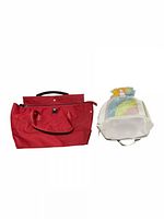 Red Maxx New York purse and children's white unicorn mini backpack side by side