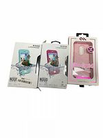 Three new cell phone cases in packaging: two LifeProof Nüüd cases and one Sweet Crystal case