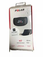 Front of closed box showing image of the Polar H7 heart rate sensor and branding