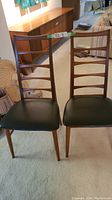 Front view of both chairs showing overall condition and style