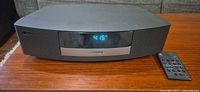 Front view of Bose Wave Radio III showing display and remote