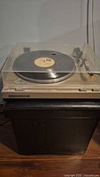 Full view of Marantz TT1200 turntable with dust cover closed
