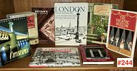 Image of 8 books on City of London and British cities, arranged on a shelf showing front covers and some angled views.
