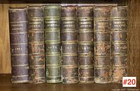 Full set of 7 Chambers Journal volumes from 1864 to 1883 showing spines and varying wear conditions on leather-bound spines and covers.